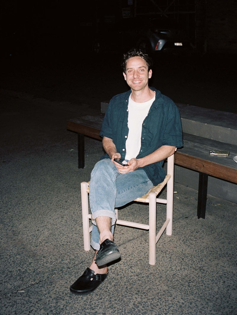 ISAAC ON WOVEN CHAIR