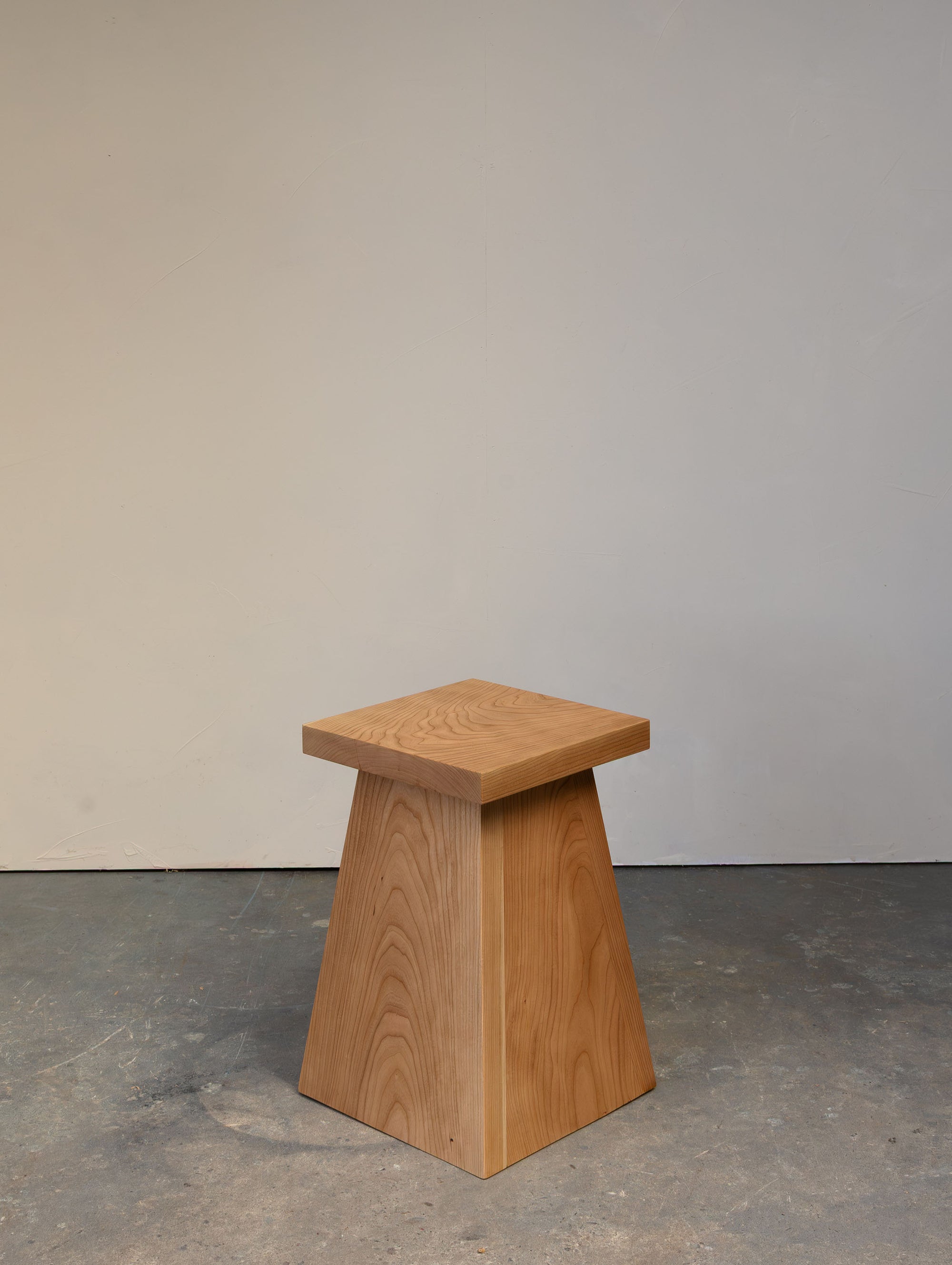 Pyramid Stool in solid American Cherry, front three-quarter view, Chatterton Studio